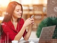 elegant-woman-with-laptop-listening-music